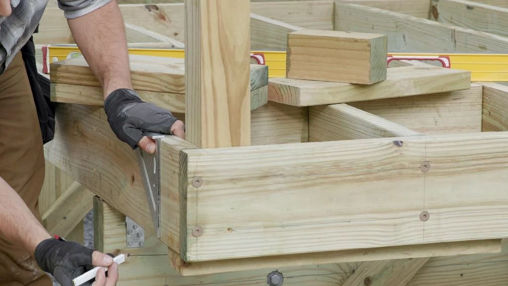 How do you attach a guard rail post to a deck